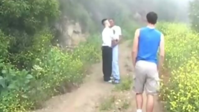 Interracial trio of twinks busted fucking alfresco