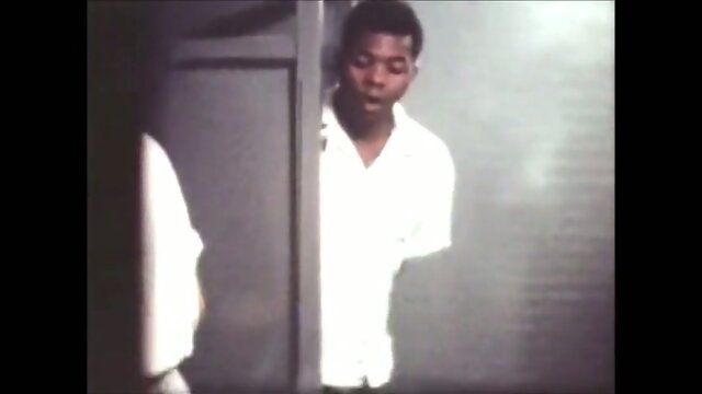 USA, 1962. Spied, in toilets, by the police.