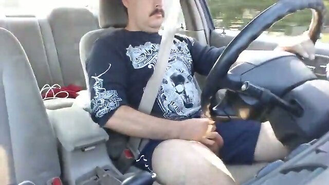 Driving and stroking my cock