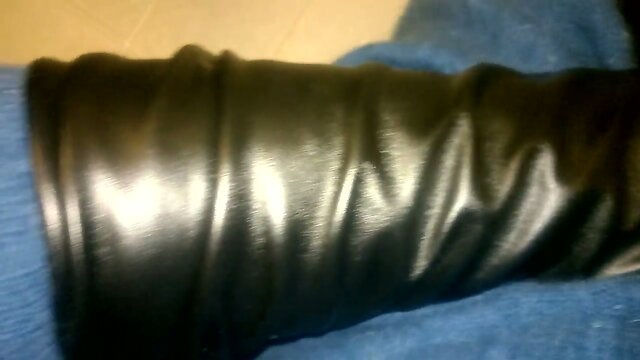 Cumming on leather glove