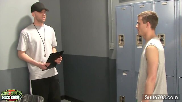 Playful jocks knocking off in locker room