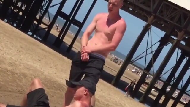 Excited shirtless dude adjusts his bulge in front of