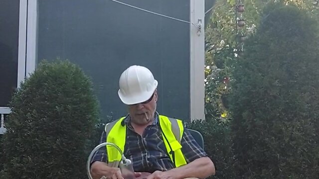 Construction dad exhausted after a long, hot day of