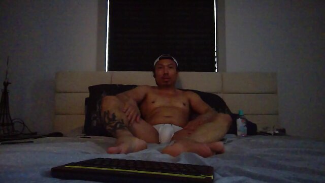 Xian_quatro blowing clouds in white speedos!