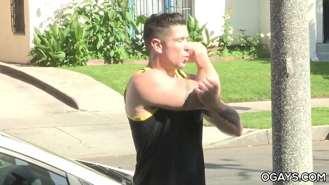 Young man engages in intimate encounter with muscular