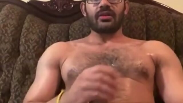 Webcam flexing with a hunky indian-canadian muscle stud