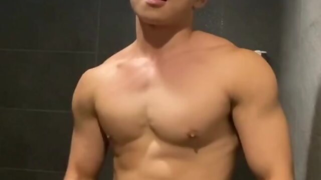 Public shower jerk and cum: muscular hunk in white