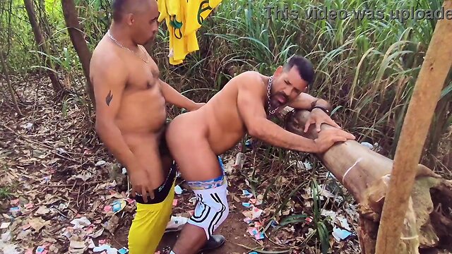 A fat negao fucked his friend in the forest to